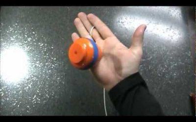 How to balance a spintop in your hand