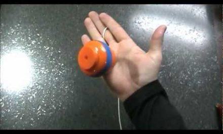 How to balance a spintop in your hand
